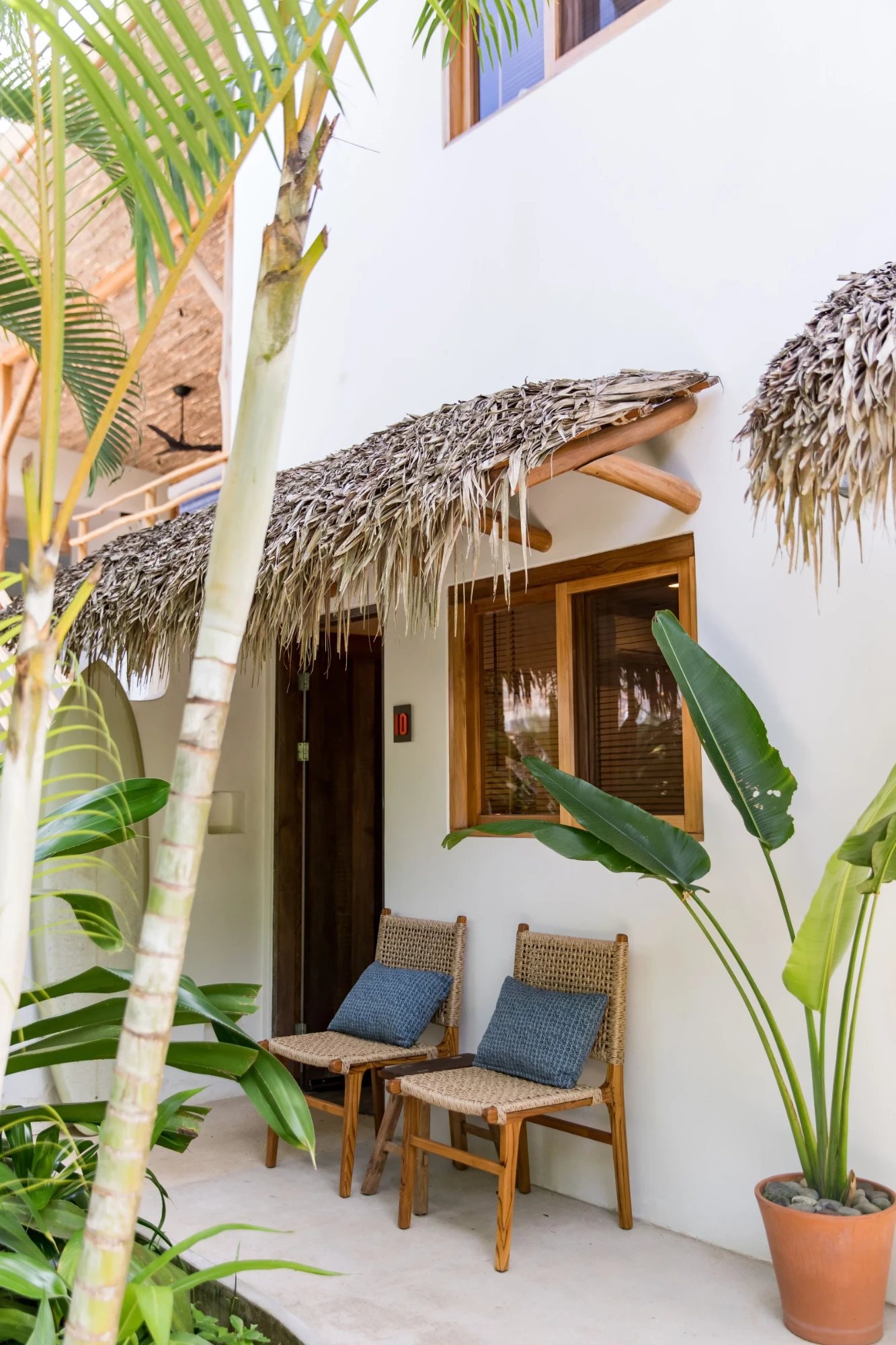 A room's palm-thatched patio
